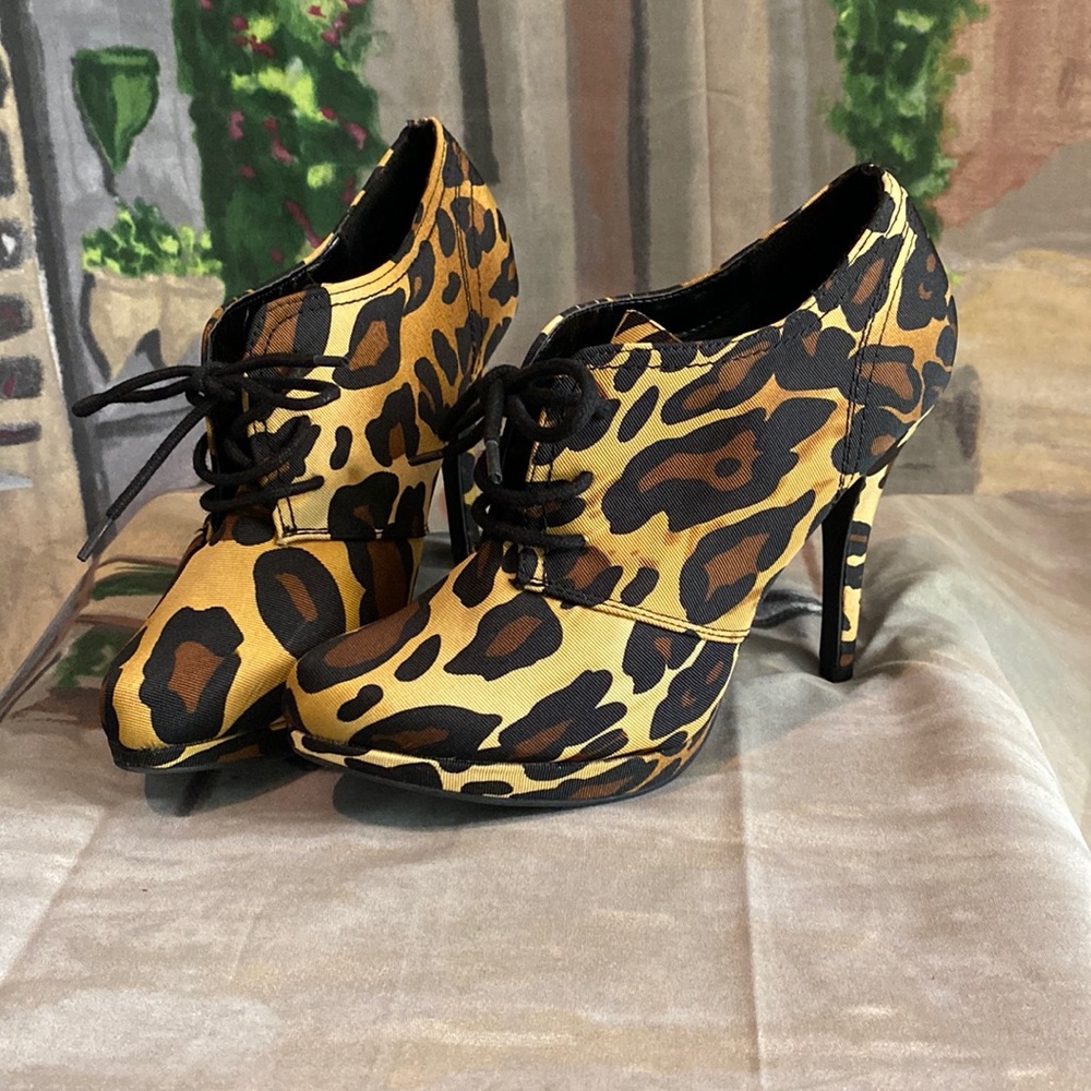 Cheetah print lace up heals